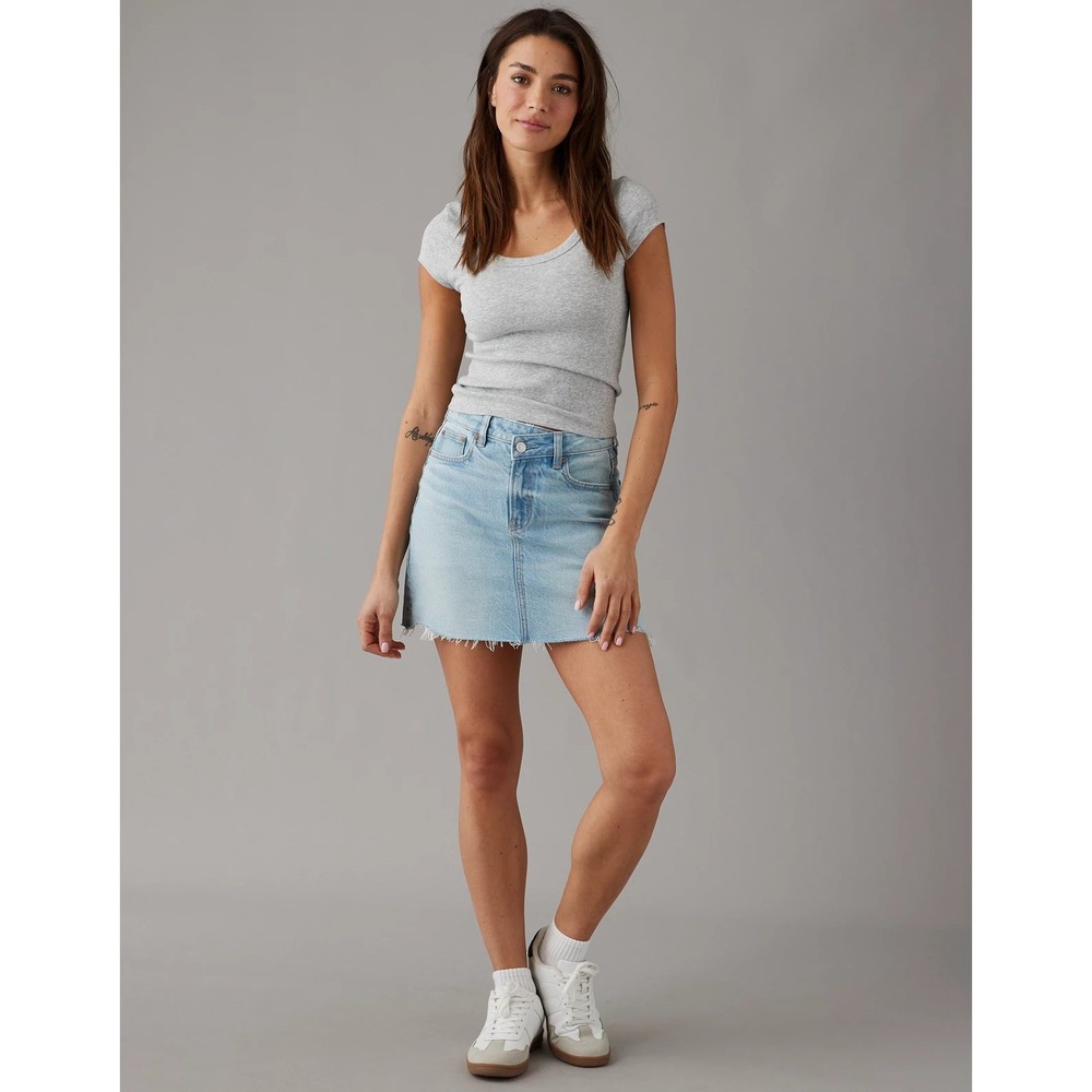 American Eagle Perfect Mini Light Wash Denim Skirt Raw Hem Size 0 Stretch